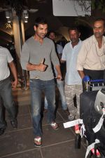 John Abraham snapped at the airport in Mumbai on 4th Jan 2012 (13).jpg